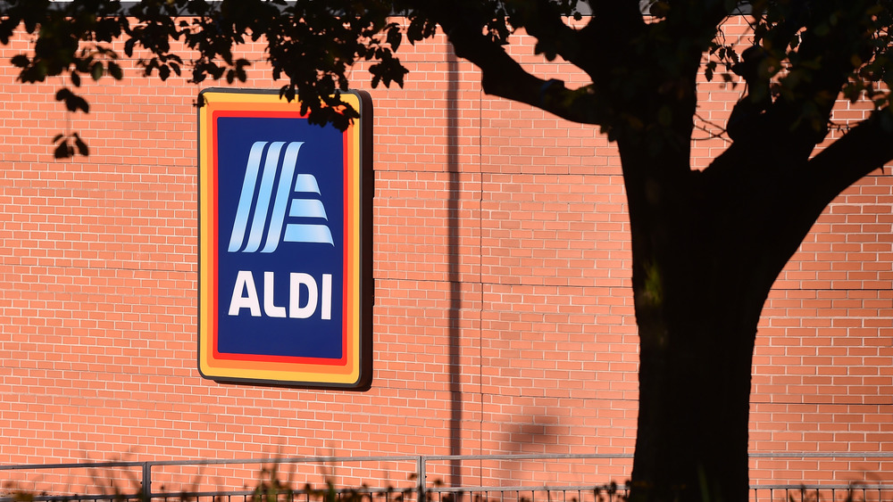 Aldi sign on brick building