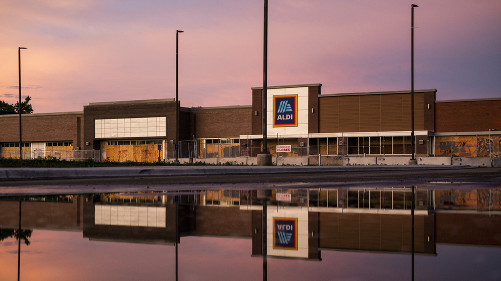 Aldi store exterior water reflection