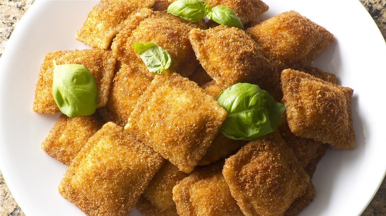 Toasted ravioli on plate