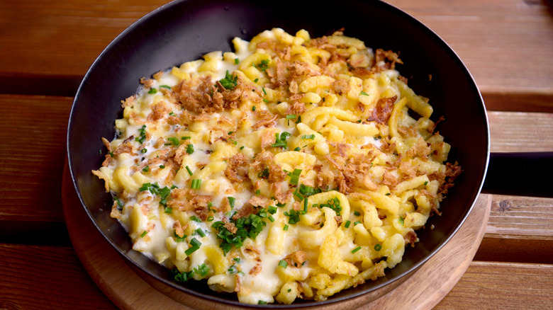 Spatzle on a black plate
