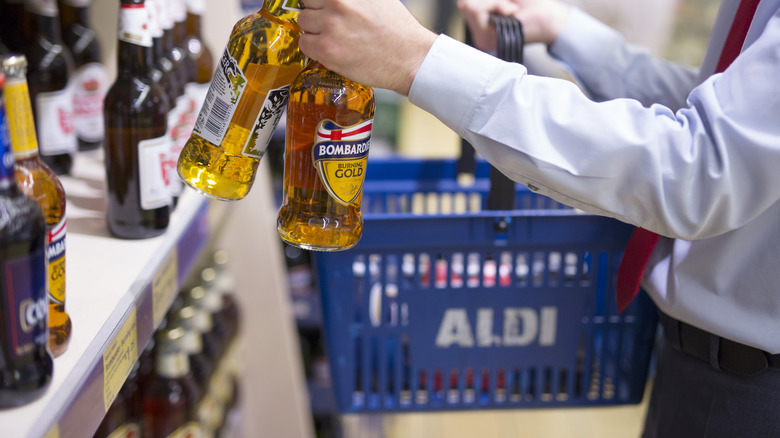 customer buying beer at aldi