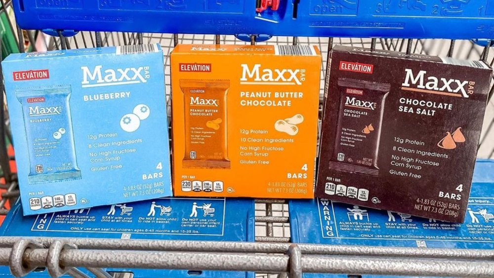 Boxes of Aldi Elevation Maxx Bars in Blueberry, Chocolate Peanut Butter, and Chocolate Sea Salt flavors