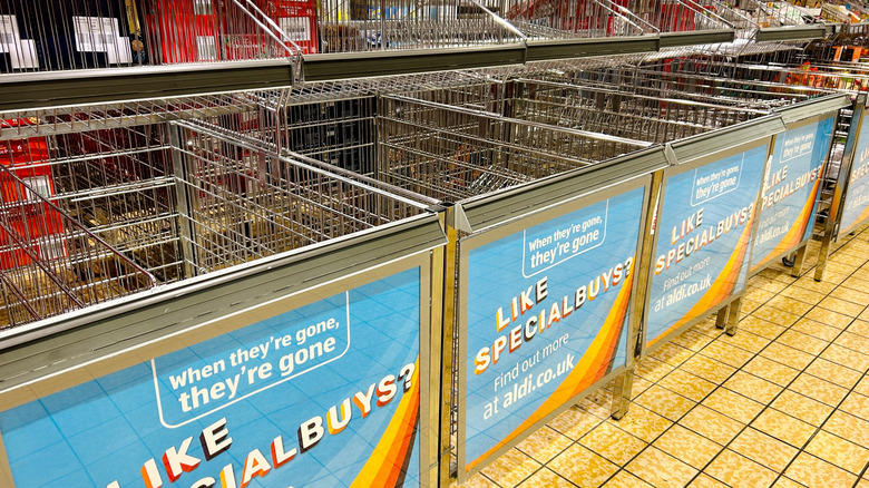 Empty metal baskets for Special Buys at an Aldi supermarket