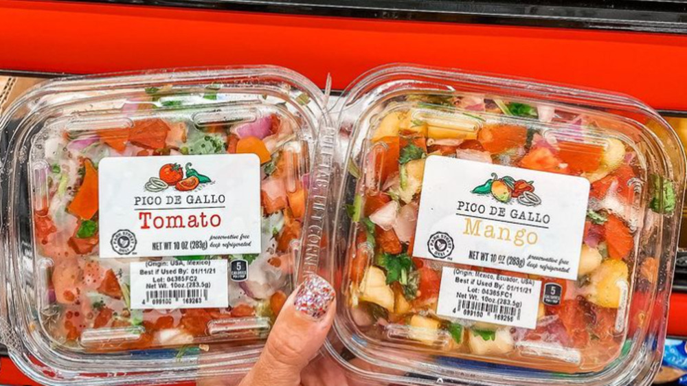 Packages of Aldi's mango and tomato pico de gallo