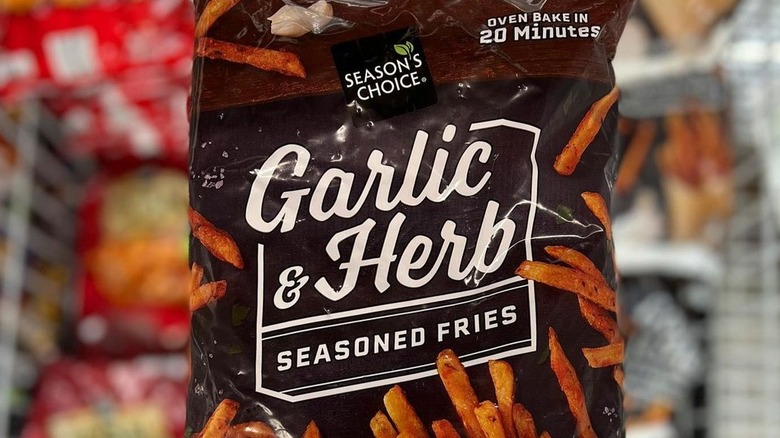A bag of Aldi's garlic and herb seasoned french fries