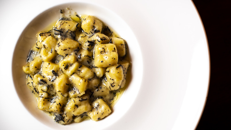 gnocchi in white bowl