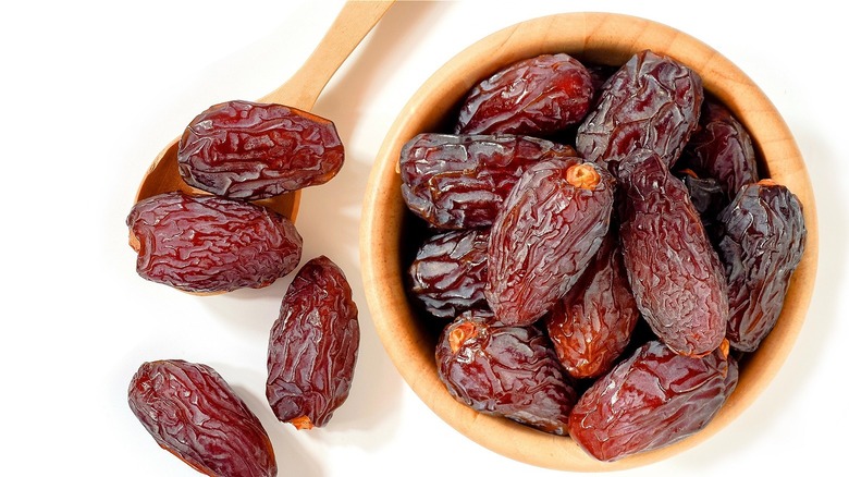 dates in bowl and spoon