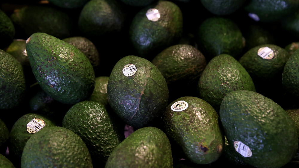 Bin of avocados at the store