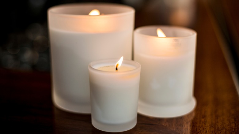 three candles of various sizes