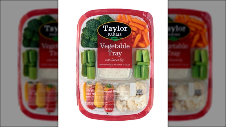 Packaged snack tray with assorted vegetables and ranch dip