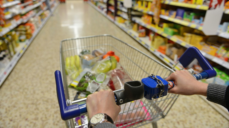 Shopping cart in Aldi aisle 