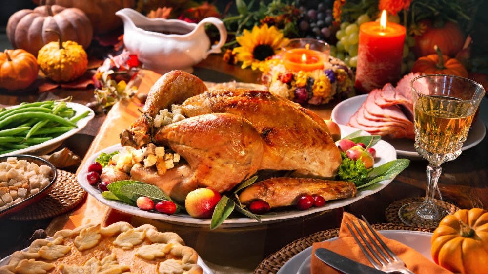 Thanksgiving table with turkey and sides