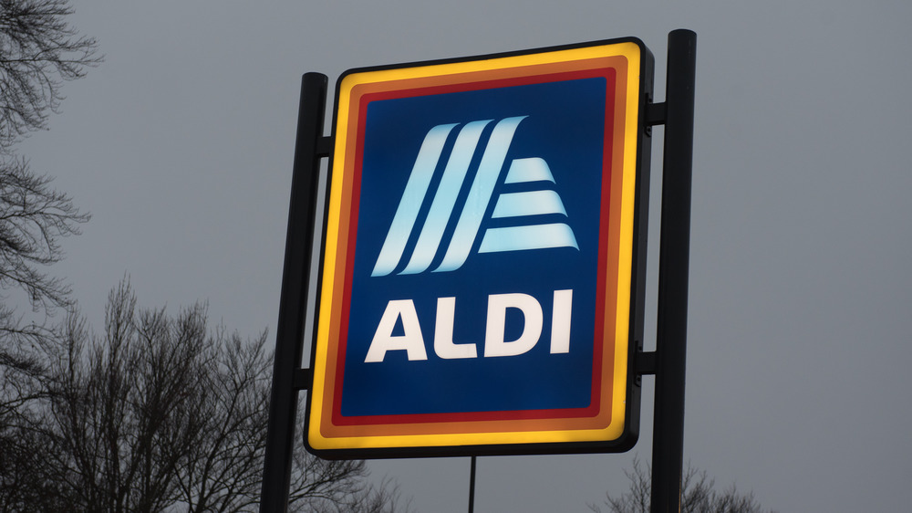 Aldi sign with dark sky 