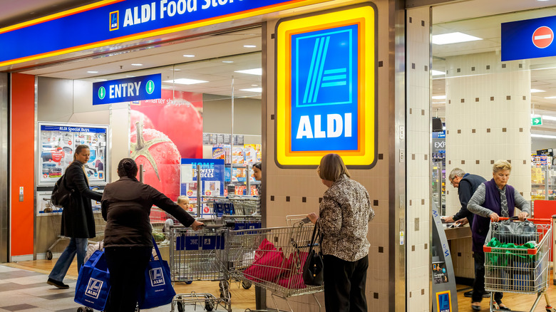 shoppers at Aldi store entrance