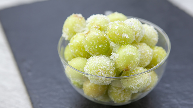 frozen grapes in a dish