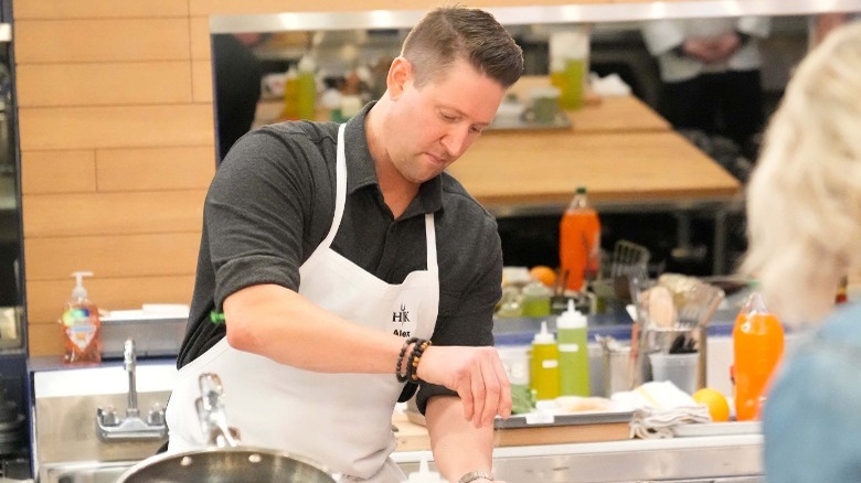 Alex Belew competing on Hell's Kitchen
