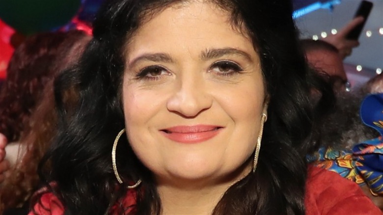 Alex Guarnaschelli wearing hoop earrings