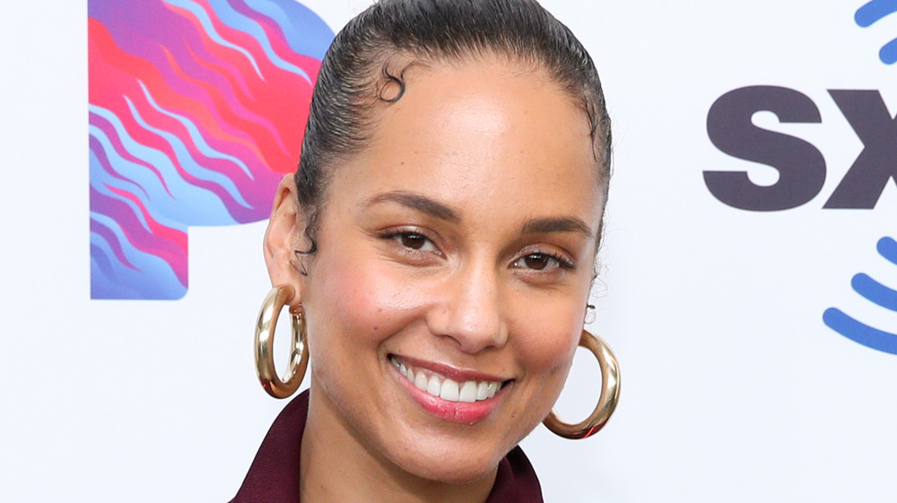 Alicia Keys smiling big