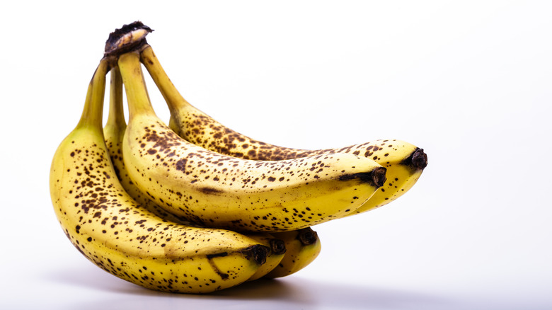 Ripe bananas with brown spots