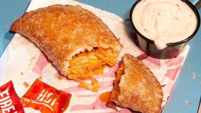 Promotional photo of Taco Bell Cheesy Chicken Crispanada