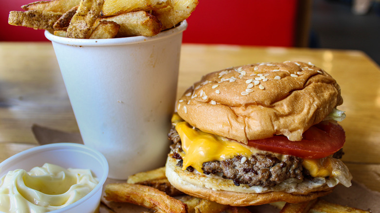 burger and fries in car