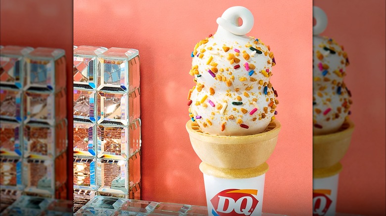 Dairy Queen vanilla cone with sprinkles and trademark curl