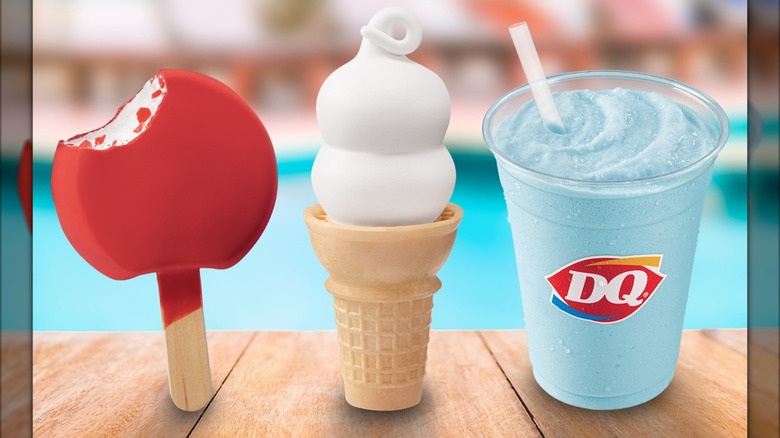 DQ Dilly bar, vanilla cone, and drink on table