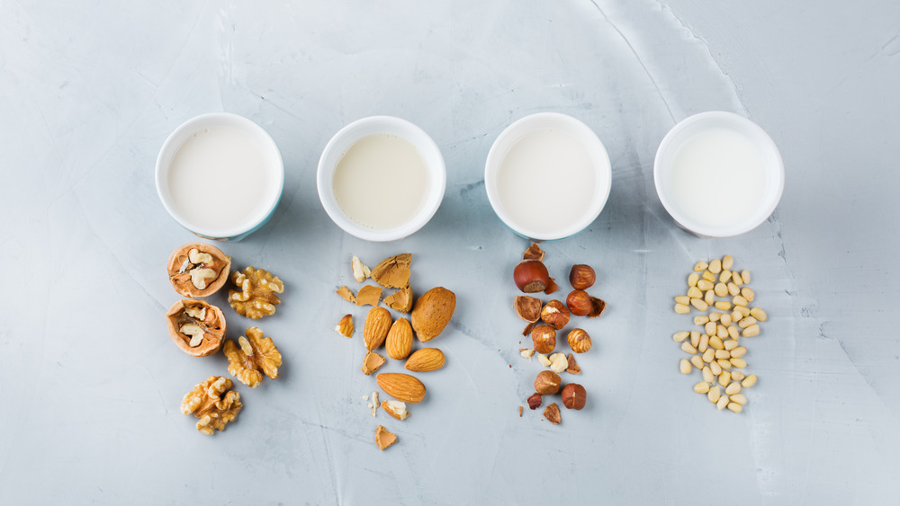 Different types of milk with nuts 