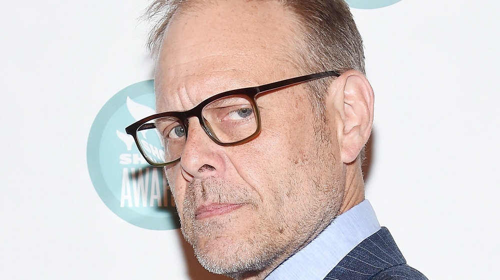 Alton Brown scowling