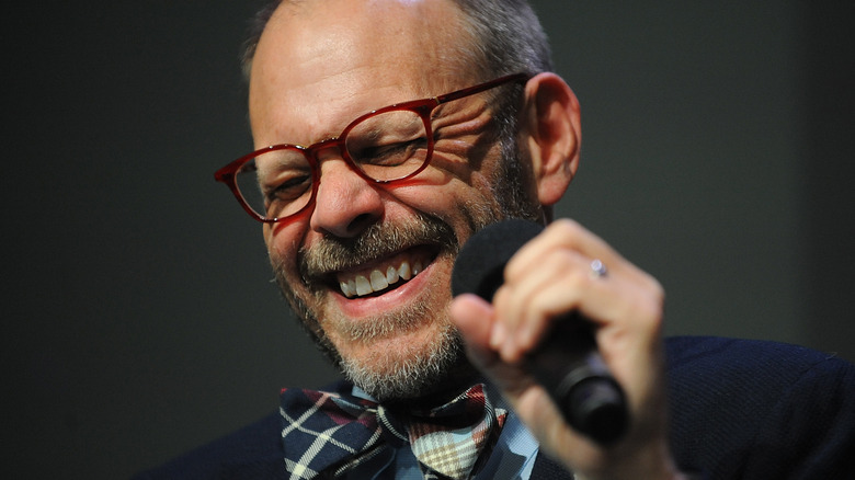Alton Brown laughing while on stage