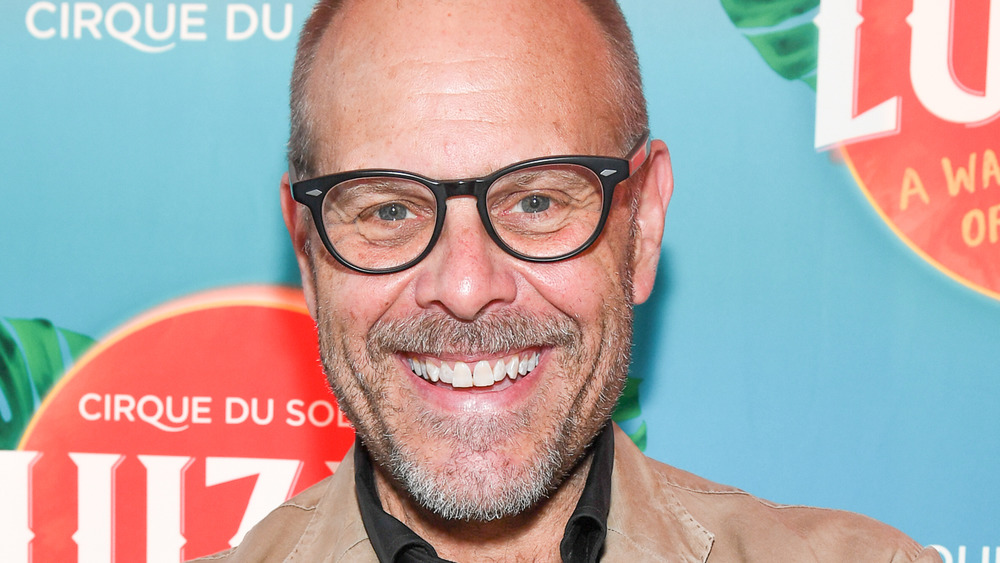 Alton Brown smiling at event