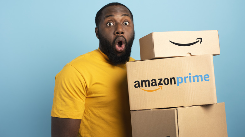 Excited man with amazon boxes