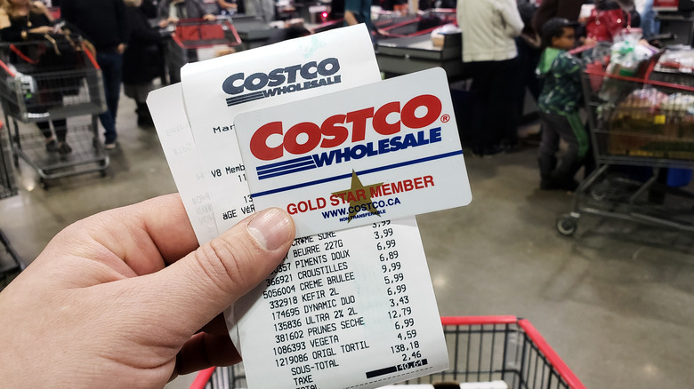 Costco membership card and grocery cart