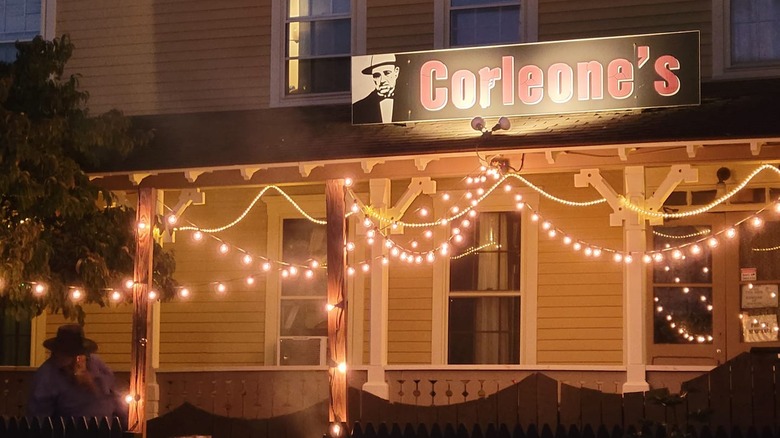 Front of Corleone's with Christmas lights and a sign reading "Corleone's"