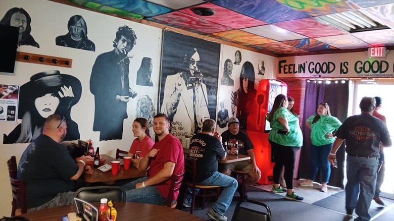 people eating and standing inside of Gayle's