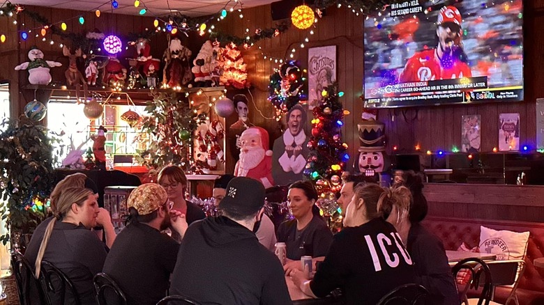 Interior of a bar decorated with christmas lights