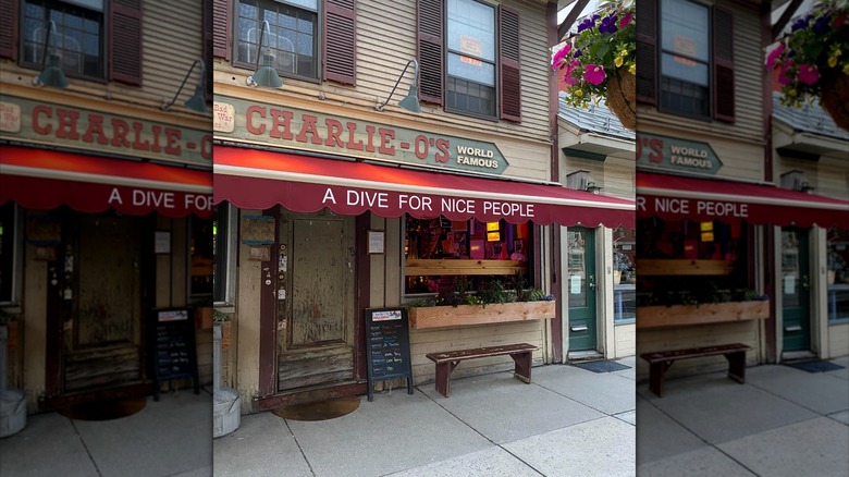 outside of charlie o's with signs that read "world famous", and "a dive for nice people"