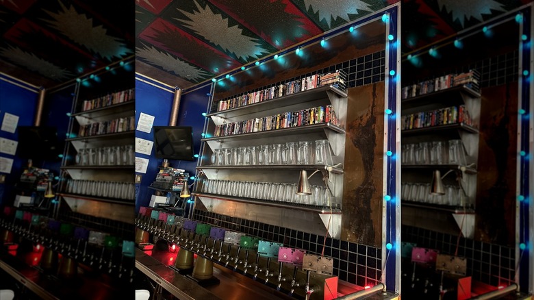 bar with beers on tap and glasses
