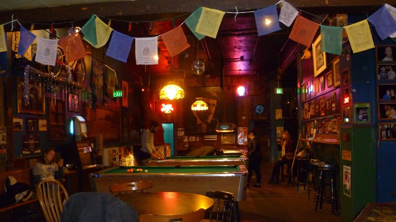 interior of a bar with pool tables