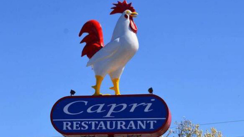 iconic rooster sign at Capri Restaurant