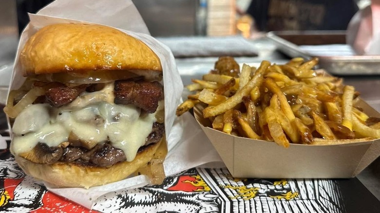 A bacon cheeseburger with house cut fries at The Roadhouse Diner