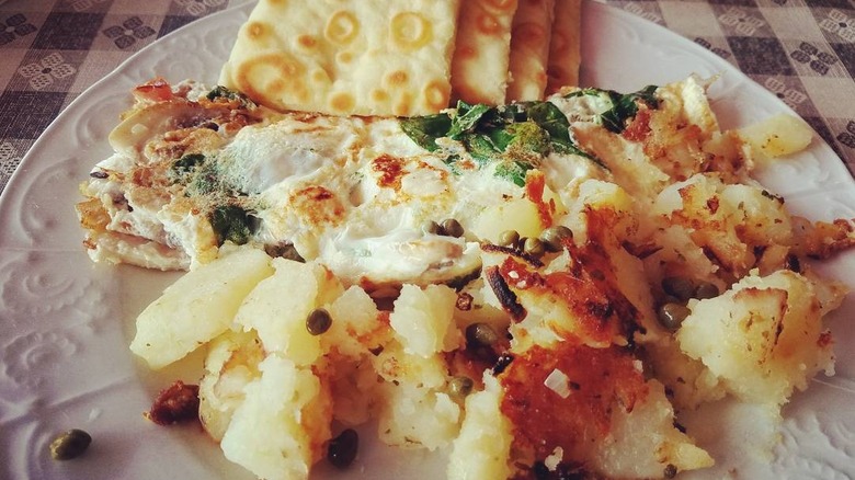 A omelette with pita bread and potatoes served at Colonel's Cafe