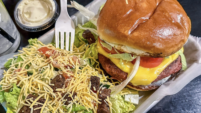 Eight & Sand veggie burger and salad