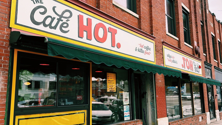 Red-brick frontage of The Café Hot