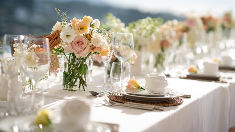 Fine dining, flowers, white tablecloth