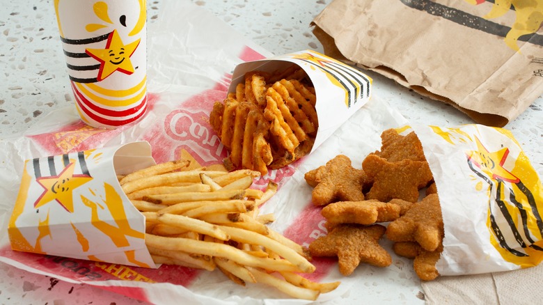 Spread of food from Carl's Junior on white counter