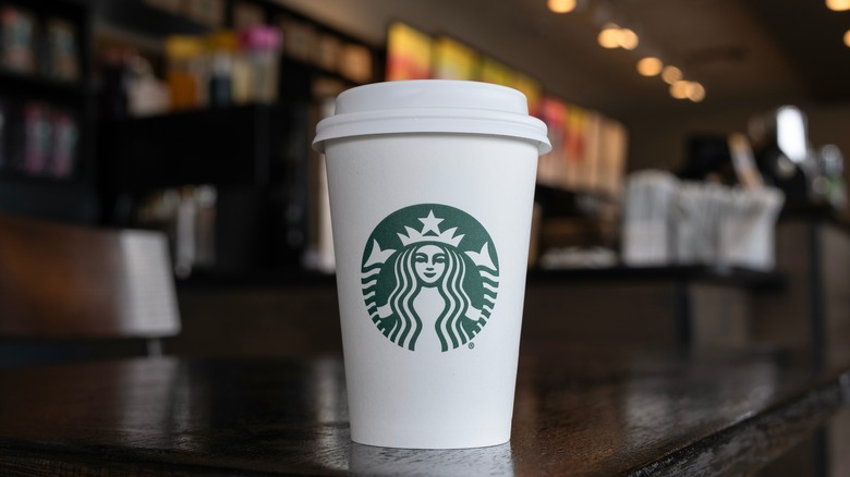 A Starbucks drink on a wooden table