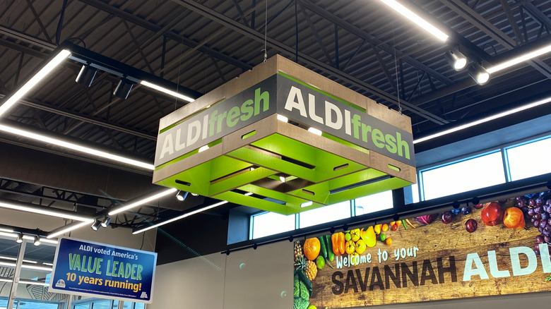Aldi Fresh sign hanging from ceiling 