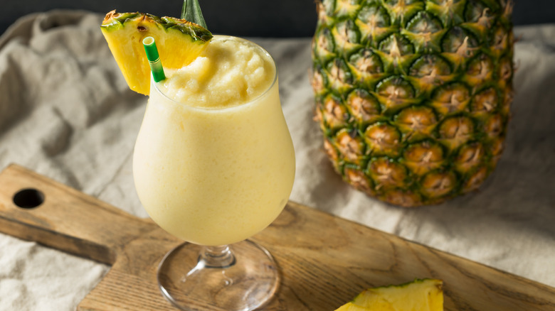 pina colada with pineapple wedge