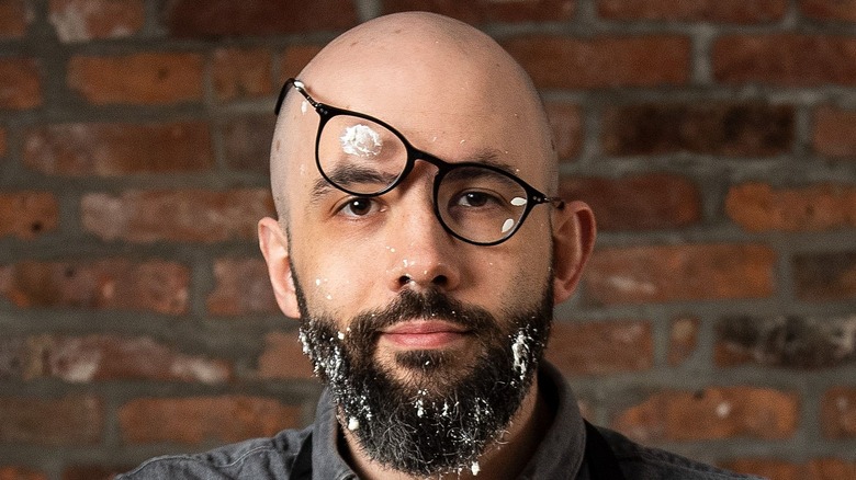 https://www.mashed.com/img/gallery/andrew-rea-tells-us-how-binging-with-babish-got-started-exclusive/intro-1632318996.jpg